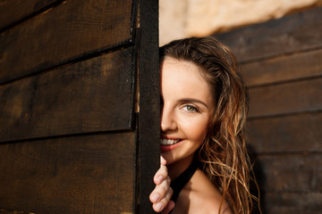 Beautiful young  cheerful girl rest at morning beach