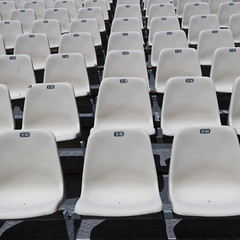 Fototapeta premium Empty numbered seats in a stadium