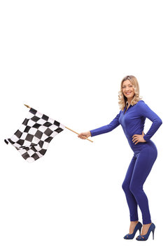 Attractive woman waving a race flag
