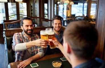 happy male friends drinking beer at bar or pub