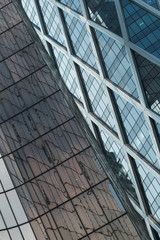 Obraz premium Skyscrapers with glass facade. Modern buildings in Paris business district. Concepts of economics, financial, future. Copy space for text. Dynamic composition.
