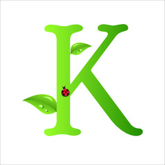 ecological K with green leaves and water drops and ladybug, original design font.