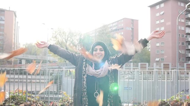 Throwing leaves over head