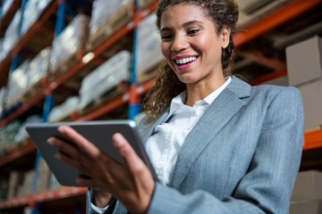 Business woman using her tablet