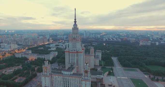 Drone Flying Near the Main Building of Moscow State University in Moscow in the Dusk on a Summer Day. Epic Aerial view of the City.