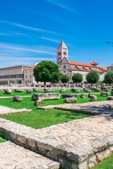 Fototapeta na wymiar Church and Monastery of St. Mary and the ancient monuments in front of the church in Zadar, Croatia