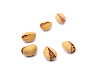 Pile of fruit pistachios isolated on white background