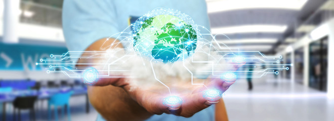 World and cloud connections in businessman hand © sdecoret