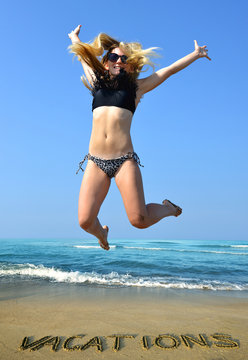 Young happiness woman jumping high by the sea. The concept of summer vacations.