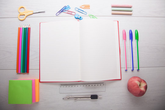 office supplies on white desk