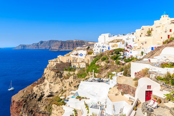 View of famous Oia village with colorful houses, Santorini island, Greece