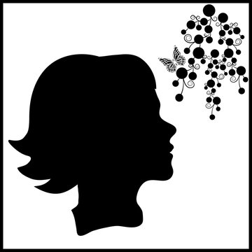 Silhouette of girl with grapes