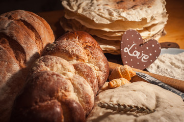 Variety of bakery products on a wooden table