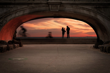 Beautiful small stone beach-side foot bridge in Australia with p