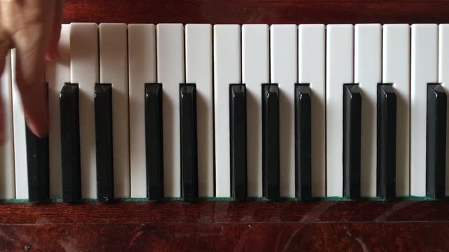 piano, close-up of piano keys and piano hands, shooting 4K