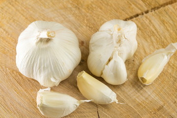 Whole and slices of garlic. Healthy vegetable