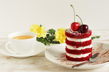 red cake with cherry