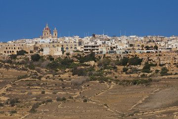 Houses on top the hills of the island of Gozo in Malta 