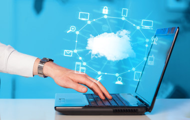 Hand working with a Cloud Computing diagram