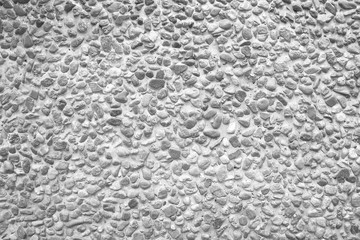 Wall of small sand stone,gravel wall texture background