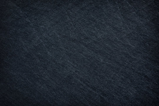 Dark black slate abstract background or texture.