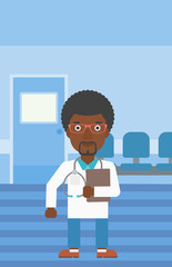 Doctor with file in medical office.