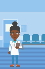 Doctor with file in medical office.