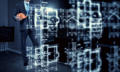 Man engineer at work . Mixed media