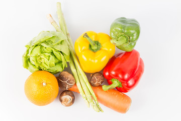 Mixed Fresh Vegetables and fruit on white