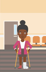Woman with broken leg and crutches.