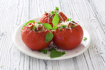 Tomatoes stuffed with mince and cheese