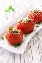 Tomatoes stuffed with mince and cheese