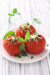 Tomatoes stuffed with mince and cheese