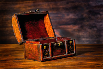 beautiful vintage treasure of mystery chest on wooden background