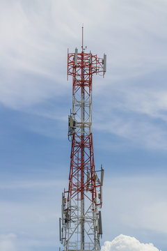 Telecommunications tower. Mobile phone base station with blue sky