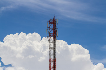 Telecommunications tower. Mobile phone base station with blue sky