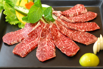 Premium raw japanese beef sliced on plate