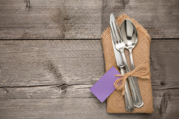 Silverware with an empty tag on a table