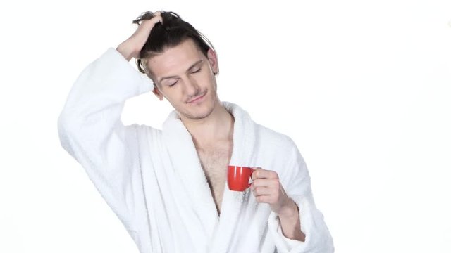 Man yawns, hair combs and drinking coffee. White background