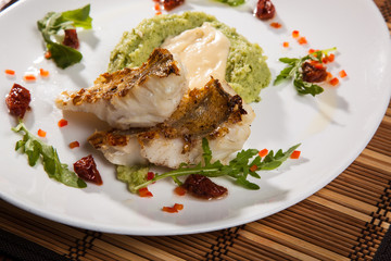Pikeperch with mashed potatoes and dried tomatoes