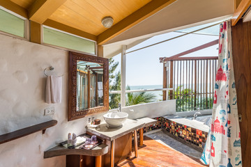 Interior of the modern design bathroom with sea view