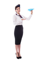 full length portrait of young stewardess with paper plane isolat