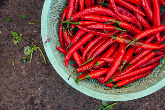 Basket with chili peppers at the street market, Vietnam