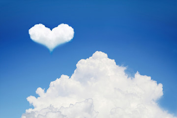 Plakat huge white cloud with heart shaped cloud