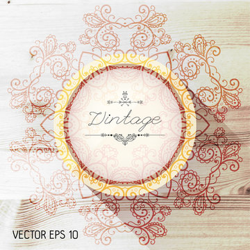 Vintage frame on a realistic wood texture , vector