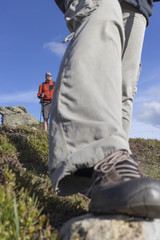 Hiking in the mountains in the summer on a sunny day.