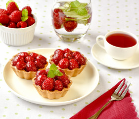 Fruit raspberry cakes on a table
