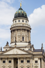 Fototapeta na wymiar beautiful French Cathedral at famous touristic square Gendarmenmarkt in Berlin