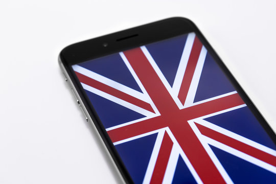 Brand black Apple iPhone 6s and British flag on the screen. Chel