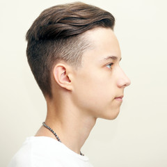Young man profile face over gray background - 115936314